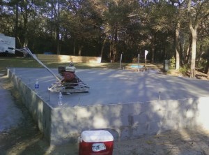 Garage Slab with slicking machine